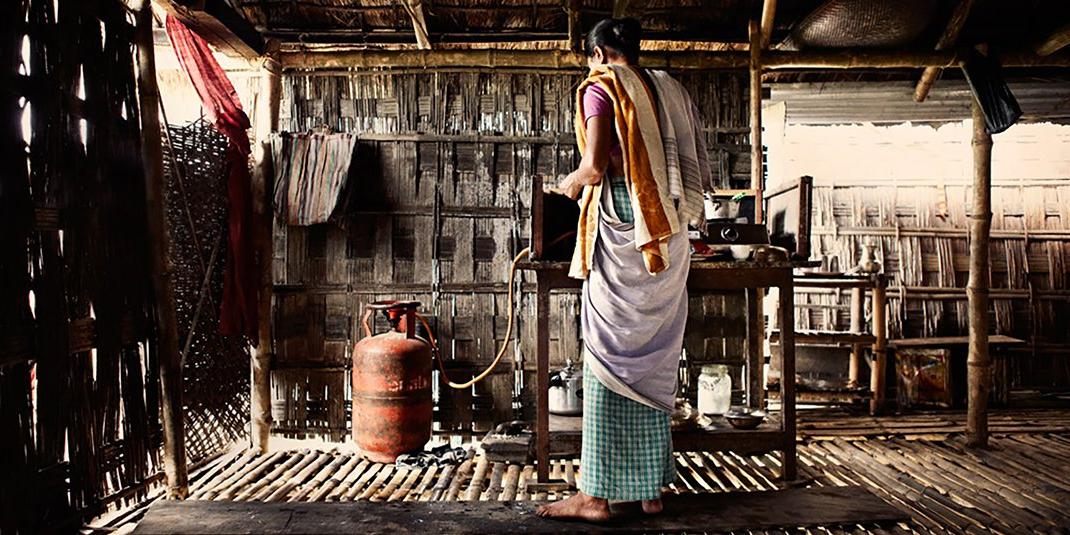 A woman cooking in India